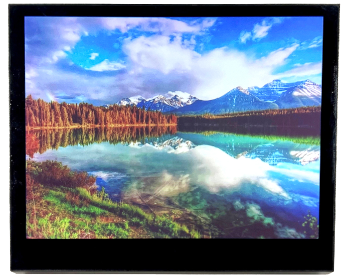 low energy epaper display with a colorful image of blue skies reflecting in a lake